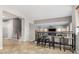 Open layout combines breakfast nook and living room to create a welcoming living space at 2336 W Laredo Ln, Phoenix, AZ 85085