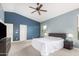 Bright main bedroom with ceiling fan, and a window providing natural light at 2336 W Laredo Ln, Phoenix, AZ 85085
