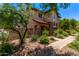 Beautiful two-story home with desert landscaping and a welcoming walkway to the front door at 2547 E Vermont Dr, Gilbert, AZ 85295