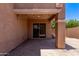Back patio with concrete flooring and sliding glass door at 2547 E Vermont Dr, Gilbert, AZ 85295