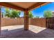Covered patio with stamped concrete and string lights at 2547 E Vermont Dr, Gilbert, AZ 85295