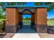 Community picnic shelter with block construction and seating on concrete pad at 2547 E Vermont Dr, Gilbert, AZ 85295
