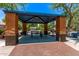 Covered picnic area with seating and a grill, perfect for outdoor gatherings and cookouts at 2547 E Vermont Dr, Gilbert, AZ 85295