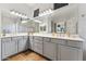 Bright bathroom with double vanity, large mirror, and ample counter space at 2830 S Riata Ct, Gilbert, AZ 85295