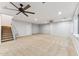 Large bonus room featuring neutral carpet, recessed lighting, and two ceiling fans at 2830 S Riata Ct, Gilbert, AZ 85295