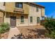 Charming two-story townhome with low maintenance front yard and inviting front entry at 336 N 168Th Dr, Goodyear, AZ 85338