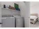 Bright laundry room featuring a washer and dryer at 336 N 168Th Dr, Goodyear, AZ 85338