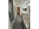 Bright bathroom featuring a shower, bathtub, and vanity with neutral toned countertops and gray floors at 3480 E Sheffield Rd, Gilbert, AZ 85296