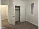 Bedroom with neutral walls, carpet, and a closet at 3480 E Sheffield Rd, Gilbert, AZ 85296