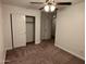 Bedroom with neutral walls, carpet, and a ceiling fan at 3480 E Sheffield Rd, Gilbert, AZ 85296