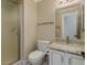 Bathroom with single sink vanity, granite countertop, and shower at 3634 N Desert Oasis --, Mesa, AZ 85207