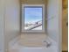 Bathroom with soaking tub under window and shower at 3634 N Desert Oasis --, Mesa, AZ 85207