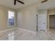 Bright bedroom features marble floors, and two doors, all enhanced by natural light at 3634 N Desert Oasis --, Mesa, AZ 85207