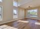 Bright living room with hardwood floors, recessed lighting, and large windows at 3634 N Desert Oasis --, Mesa, AZ 85207