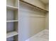 Spacious walk-in closet featuring built-in shelving and hanging racks at 3634 N Desert Oasis --, Mesa, AZ 85207