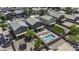 A beautiful aerial view of the property showcasing a private pool and well-maintained backyard in a suburban setting at 36562 W Nina St, Maricopa, AZ 85138