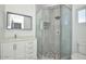 Elegant bathroom features a glass-enclosed shower with stylish tiling, a modern vanity, and a well-lit mirror at 3831 N 8Th St, Phoenix, AZ 85014
