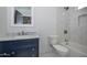 Stylish bathroom featuring a marble countertop, new fixtures, and a tiled shower at 3831 N 8Th St, Phoenix, AZ 85014