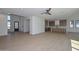 Bright living room with hardwood floors open to kitchen and staircase at 3831 N 8Th St, Phoenix, AZ 85014