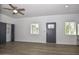 Bright living space boasting wood floors, a modern front door, and ample natural light at 3831 N 8Th St, Phoenix, AZ 85014