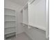 Walk-in closet with custom shelving and ample storage space at 3831 N 8Th St, Phoenix, AZ 85014