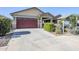 Charming single-Gathering home with a two-car garage and well-maintained landscaping at 40060 W Wade Dr, Maricopa, AZ 85138