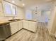 Updated kitchen with stainless steel appliances, modern countertop and hardwood style flooring at 4303 E Cactus Rd # 135, Phoenix, AZ 85032