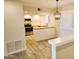 Bright kitchen with updated appliances, granite countertops, and shaker-style cabinets at 4303 E Cactus Rd # 135, Phoenix, AZ 85032