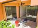 Cozy outdoor patio with seating area and bright sunlight at 4303 E Cactus Rd # 135, Phoenix, AZ 85032