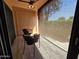 Relaxing seating area on the patio with bright sunlight at 4303 E Cactus Rd # 135, Phoenix, AZ 85032