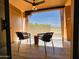 Relaxing patio with comfortable chairs and a privacy screen at 4303 E Cactus Rd # 135, Phoenix, AZ 85032