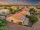 Aerial view of the home featuring a covered patio and desert landscaping at 4906 S Verbena Ave, Gilbert, AZ 85298