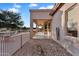 Wide view of the backyard highlighting the patio, landscaping, and proximity to the golf course at 4906 S Verbena Ave, Gilbert, AZ 85298