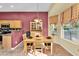 Cozy breakfast nook with natural light from windows overlooking the backyard at 4906 S Verbena Ave, Gilbert, AZ 85298