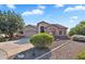 Charming single-Gathering home showcasing attractive landscaping and a convenient two-car garage at 4906 S Verbena Ave, Gilbert, AZ 85298