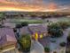 Lovely single-story home on a golf course featuring desert landscaping and an attached two-car garage at 4906 S Verbena Ave, Gilbert, AZ 85298