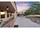 Covered patio with an outdoor kitchen, desert landscaping, and beautiful views of the surrounding landscape at 4906 S Verbena Ave, Gilbert, AZ 85298