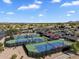 A stunning aerial view of the community tennis courts on a bright day at 4906 S Verbena Ave, Gilbert, AZ 85298