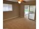 Bedroom featuring neutral carpet and sliding glass doors to an enclosed patio at 6841 E Vista Dr, Paradise Valley, AZ 85253