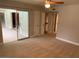 Bedroom featuring neutral carpet, sliding glass doors to an enclosed patio, and a closet at 6841 E Vista Dr, Paradise Valley, AZ 85253
