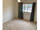 Bedroom featuring neutral carpeting, a window, and neutral curtains at 6841 E Vista Dr, Paradise Valley, AZ 85253