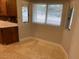 Bright breakfast nook with tile floor and a window with natural light at 6841 E Vista Dr, Paradise Valley, AZ 85253