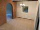 Elegant dining room boasts custom built-ins and soft natural light from the adjacent spaces at 6841 E Vista Dr, Paradise Valley, AZ 85253
