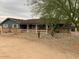 Inviting single-story home featuring a covered front porch and simple desert landscaping at 6841 E Vista Dr, Paradise Valley, AZ 85253