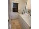 Functional laundry room featuring a white washer and dryer set, and a convenient utility sink at 6841 E Vista Dr, Paradise Valley, AZ 85253