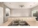 Open-concept kitchen with stainless steel sink, counter space, and view to adjacent room at 689 E Stottler Dr, Gilbert, AZ 85296