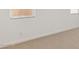 Neutral carpeted bedroom shows baseboard and electrical outlets at 7327 W Buckhorn Trl, Peoria, AZ 85383