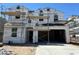 New construction two-story home showing scaffolding and exterior framework details at 7327 W Buckhorn Trl, Peoria, AZ 85383