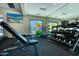 Community gym featuring free weights, fitness balls, and a TV with a view of the pool at 745 N Dobson Rd # 144, Mesa, AZ 85201