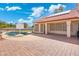 Inviting backyard pool with a basketball hoop and sunny patio, perfect for outdoor enjoyment at 7503 W Julie Dr, Glendale, AZ 85308